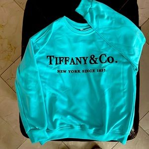Brand new women’s Tiffany &Co crewneck. Size medium but runs a little small.